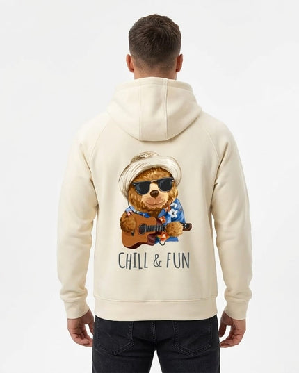 Beige hoodie with a bear playing guitar and 'Chill & Fun' text on the back, worn by a person.