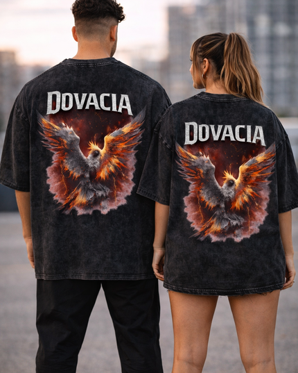 Two people wearing black t-shirts with an eagle design and 'Dovacia' branding, standing in an urban setting.