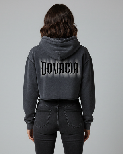 Person wearing a gray hoodie with 'DOVACIA' branding on the back against a gray background