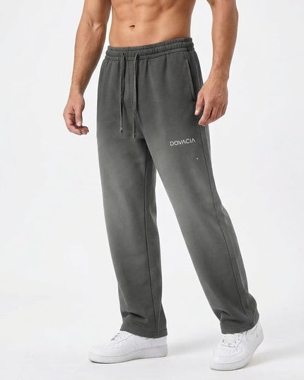 Gray sweatpants with a brand logo on a white background